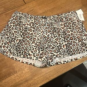 Cheetah print shorts by Flora. Size Large. Never worn.